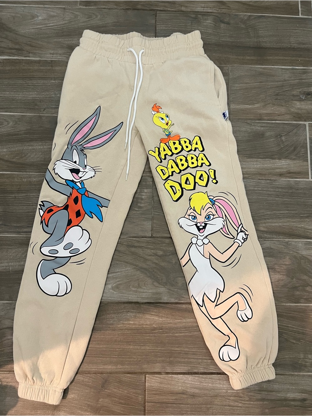 Beige Cartoon Graphic women’s Sweatpants - Yabba Dabba Doo Print